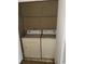 Small laundry room with side by side washer and dryer at 8517 Island Breeze Ln # 106, Temple Terrace, FL 33637