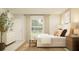 Bright bedroom with large window, light walls, white bedding, and woven bench, creating a cozy retreat at 10290 Purple Leaf Ct, Riverview, FL 33578