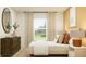 Serene bedroom with natural light, wooden furniture, and coordinated décor at 10290 Purple Leaf Ct, Riverview, FL 33578