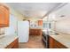 Bright, open kitchen featuring granite countertops and stainless steel appliances at 109 S Nimbus Ave, Clearwater, FL 33765