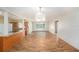 Open kitchen with wood cabinets, granite countertops, and stainless steel appliances at 109 S Nimbus Ave, Clearwater, FL 33765