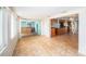 Bright living room featuring ceramic tile flooring, natural light, and an open layout for easy entertaining at 109 S Nimbus Ave, Clearwater, FL 33765