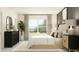 This contemporary bedroom features a large window and accent wall paint at 11115 E 65Th Ter, Palmetto, FL 34221