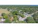 An aerial view of the neighborhood, showcasing a mix of homes and lush green trees at 11709 N Armenia Ave, Tampa, FL 33612