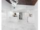 Bright, white kitchen with stainless steel appliances and a modern island at 11709 N Armenia Ave, Tampa, FL 33612