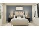Inviting main bedroom with a stylish headboard, coordinated nightstands, and tasteful wall decor at 11939 Brae Way, Dade City, FL 33525