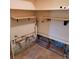 Unfinished basement area with exposed plumbing and wiring, ready for customization at 1234 11Th Se Cir, Largo, FL 33771