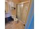 Partially renovated bathroom featuring a tiled shower and toilet, ready for final touches and customization at 1234 11Th Se Cir, Largo, FL 33771