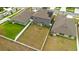 A spacious, fenced backyard with green grass and a playset, perfect for outdoor activities at 13380 Great Plains Dr, Riverview, FL 33579