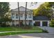 Charming two-story home with a landscaped front yard and a two-car garage at 15704 Mifflin Ct, Tampa, FL 33647