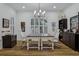 Well-lit home office featuring built in shelving, and a large table at 15704 Mifflin Ct, Tampa, FL 33647