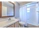 Bathroom with vanity, sink, mirror and shower and tub combo, providing a functional space at 1639 Wakefield Dr, Brandon, FL 33511
