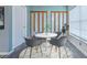 Breakfast nook features a small table with four chairs, a window with blinds, and a rug under the table at 1639 Wakefield Dr, Brandon, FL 33511