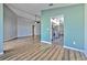 Open-concept living room boasts hardwood floors and seamless transition to the modern kitchen at 1639 Wakefield Dr, Brandon, FL 33511