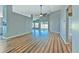 Bright living room featuring sleek wood flooring and a spacious open layout at 1639 Wakefield Dr, Brandon, FL 33511