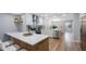 Contemporary kitchen with white countertops, stainless steel appliances, and open layout at 1715 N Alexander Rd, Tampa, FL 33603