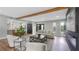 Spacious living room that opens to the kitchen and features an electric fireplace at 1715 N Alexander Rd, Tampa, FL 33603