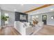 Cozy living room with modern decor and a striking electric fireplace at 1715 N Alexander Rd, Tampa, FL 33603