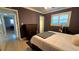 Modern bedroom featuring a spacious layout, and a large dresser at 1755 Sunset Point Rd, Clearwater, FL 33755