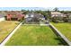 Enjoy a spacious, fenced backyard with a screened pool, and verdant lawn at 1858 Mira Lago Cir, Ruskin, FL 33570