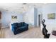 This bedroom has a plush carpet, a comfortable blue couch, and ample closet space at 1858 Mira Lago Cir, Ruskin, FL 33570