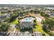 Aerial view of a community pool, clubhouse and recreational area at 1858 Mira Lago Cir, Ruskin, FL 33570