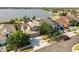Lovely two-story home boasts a well-manicured lawn and beautiful waterfront views at 1858 Mira Lago Cir, Ruskin, FL 33570