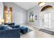 Inviting living room with ample natural light, neutral color palette, and stylish decor at 1858 Mira Lago Cir, Ruskin, FL 33570