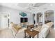 Cozy living room with comfortable seating, a large TV, and a decorative accent wall at 1858 Mira Lago Cir, Ruskin, FL 33570