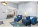 Open-concept living area with tile flooring, dining space, and a seamless flow for entertaining at 1858 Mira Lago Cir, Ruskin, FL 33570
