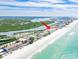 Beautiful aerial view showing beachside condos with stunning ocean and waterway access at 18650 Gulf Blvd # 203, Indian Shores, FL 33785