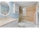Well-maintained bathroom featuring a glass shower, a cream sink and a neutral color scheme at 18650 Gulf Blvd # 203, Indian Shores, FL 33785