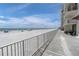 Beautiful beach view of the ocean, pristine beach, and nearby condos at 18650 Gulf Blvd # 203, Indian Shores, FL 33785