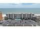 An attractive condo building with a pool and plenty of parking, located directly on the beach at 18650 Gulf Blvd # 203, Indian Shores, FL 33785