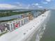 Exterior view showcases the beachfront condo with an amazing view of the beautiful white sand beach at 18650 Gulf Blvd # 203, Indian Shores, FL 33785