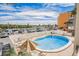 Inviting outdoor pool area with lounge chairs, perfect for relaxing and enjoying the Florida sunshine at 18650 Gulf Blvd # 203, Indian Shores, FL 33785