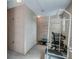 Storage room with numbered lockers and shopping carts inside a condominium complex at 18650 Gulf Blvd # 203, Indian Shores, FL 33785