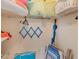 Well-organized closet with storage shelves, racks and space for beach chairs and other beach equipment at 18650 Gulf Blvd # 203, Indian Shores, FL 33785