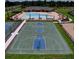 Overhead view of basketball court and community pool with lounging chairs; ready for fun and relaxation at 18657 Obregan Dr, Spring Hill, FL 34610