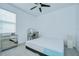 Bright bedroom with carpet flooring, closet, ceiling fan and natural light at 18657 Obregan Dr, Spring Hill, FL 34610