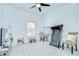 Bright bedroom with carpet flooring, closet, ceiling fan and natural light at 18657 Obregan Dr, Spring Hill, FL 34610