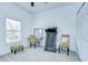 Bright bedroom with carpet flooring, closet, ceiling fan and natural light at 18657 Obregan Dr, Spring Hill, FL 34610