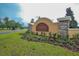 Elegant stone and stucco entrance to the Talavera community, surrounded by lush landscaping at 18657 Obregan Dr, Spring Hill, FL 34610