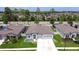 Beautiful aerial view of a single-Gathering home, showcasing its well-manicured lawn and symmetrical landscaping at 18657 Obregan Dr, Spring Hill, FL 34610