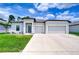 Charming single-story home with well-manicured lawn, two-car garage and a modern design at 18657 Obregan Dr, Spring Hill, FL 34610