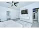 Main bedroom features a ceiling fan, carpeted floor and a walk-in closet at 18657 Obregan Dr, Spring Hill, FL 34610