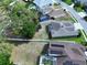 High view of the property and neighboring houses at 1919 Oswego Dr, Holiday, FL 34691