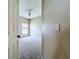 View of bright bedroom with neutral carpet and a ceiling fan from the doorway at 1919 Oswego Dr, Holiday, FL 34691