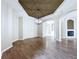 Dining room featuring wood floors, neutral paint, and modern lighting at 1919 Oswego Dr, Holiday, FL 34691
