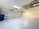 Attached two-car garage with automatic door openers and ample space for storage at 1919 Oswego Dr, Holiday, FL 34691